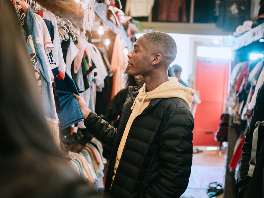 Guy shopping for clothes