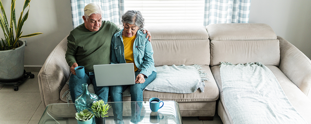 Senior couple on laptop